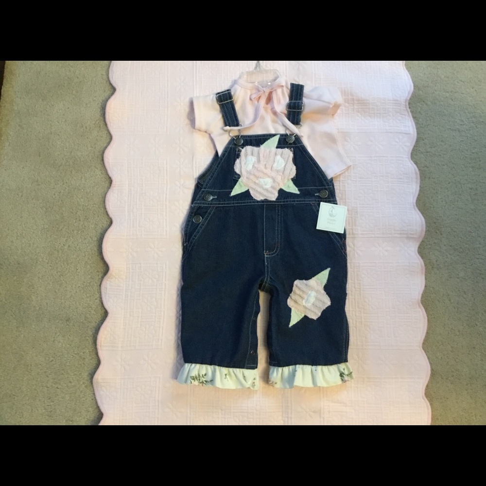 Baby girl decorated denim overall